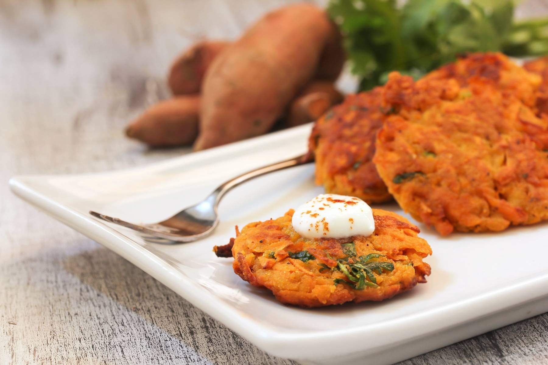 Sweet Potato Latkes Recipe with Almond Crème Fraîche - Mother Earth Living